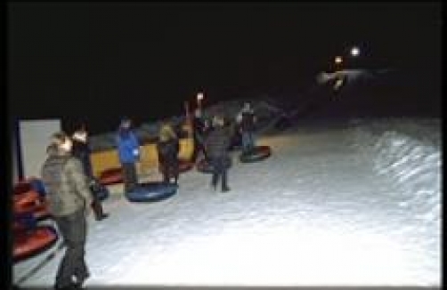 Snowtubing und Eisstockschießen in Kössen