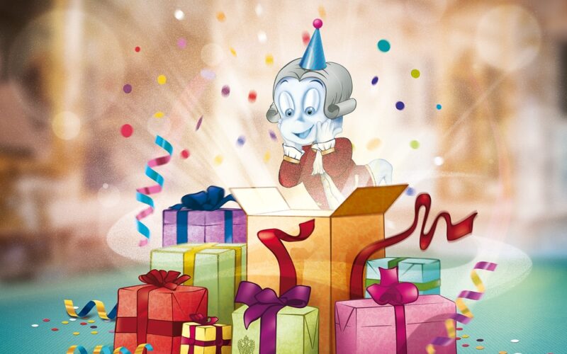 Eine Zeichentrickfigur in historischer Kleidung und mit Partyhut öffnet eine leuchtende Schachtel, umgeben von bunt verpackten Geschenken, Konfetti und Luftschlangen.