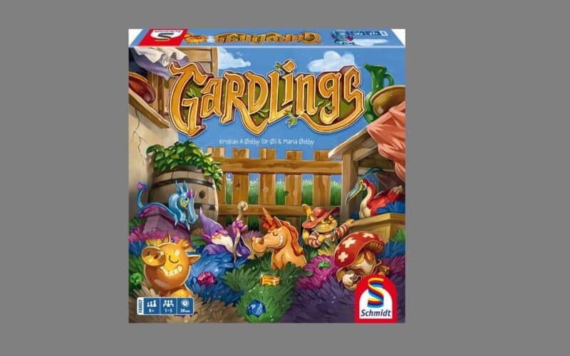 Schachtelcover des Brettspiels "GARDLINGS" mit skurrilen Gartenwesen, bunten Pflanzen und dem Logo von Schmidt Spiele in der rechten unteren Ecke.