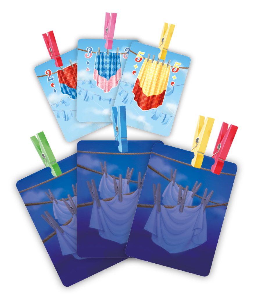 Fünf illustrierte Karten zeigen Wäsche, die mit Wäscheklammern aufgehängt ist; einige Karten haben farbige Zahlen und Wäsche, andere haben Laken und erscheinen dunkler, was auf die Nacht hindeutet.