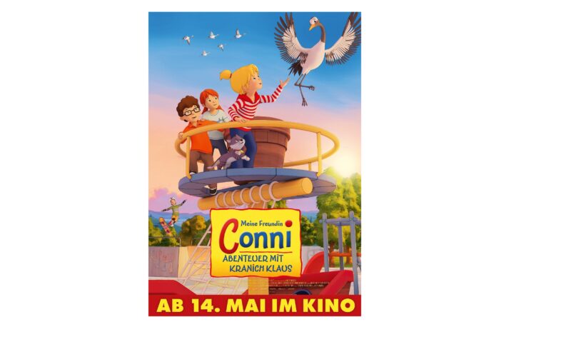 Animierte Kinder und eine Katze reiten auf einem Aussichtsturm, während über ihnen ein Storch fliegt; der Text wirbt für den Film "Meine Freundin Conni", der am 14. Mai in die Kinos kommt.