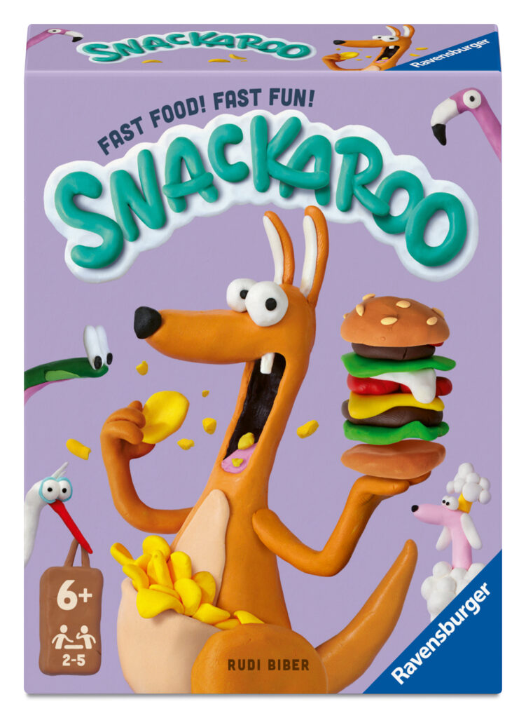 Auf einer violetten „Snackaroo“-Spielverpackung für Kinder ab 6 Jahren hält ein aus Ton geformtes Känguru-Cartoon-Figur einen großen Burger und Pommes frites in der Hand, im Hintergrund sind weitere Tierfiguren zu sehen.