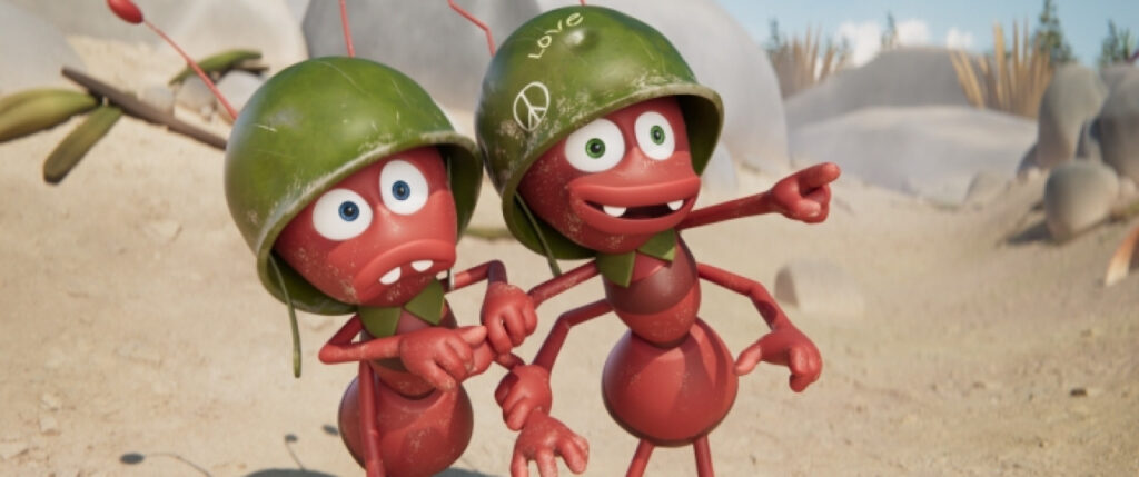 Zwei animierte rote Ameisen mit grünen Helmen stehen auf sandigem Boden; eine Ameise zeigt nach vorne, während die andere überrascht aussieht.